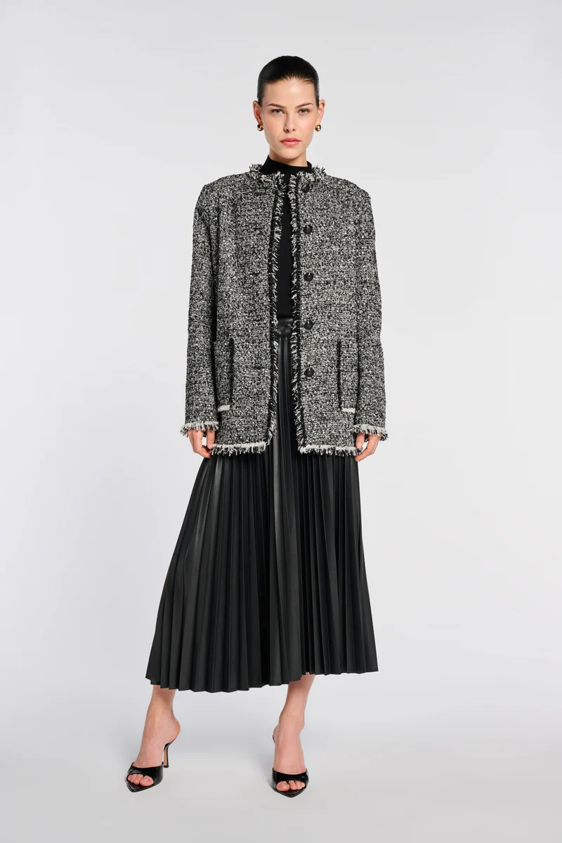 Veste longue en tweed frangée