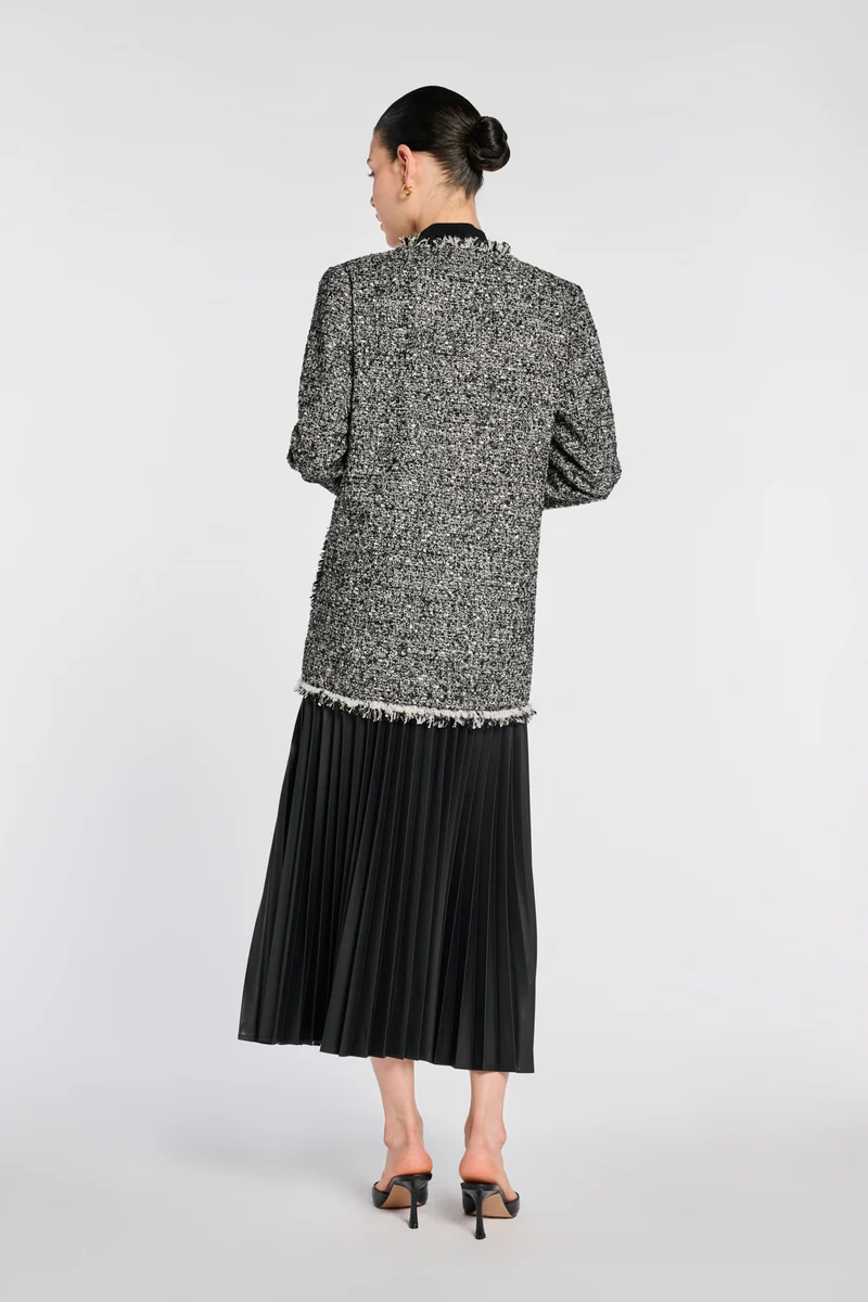 Veste longue en tweed frangée