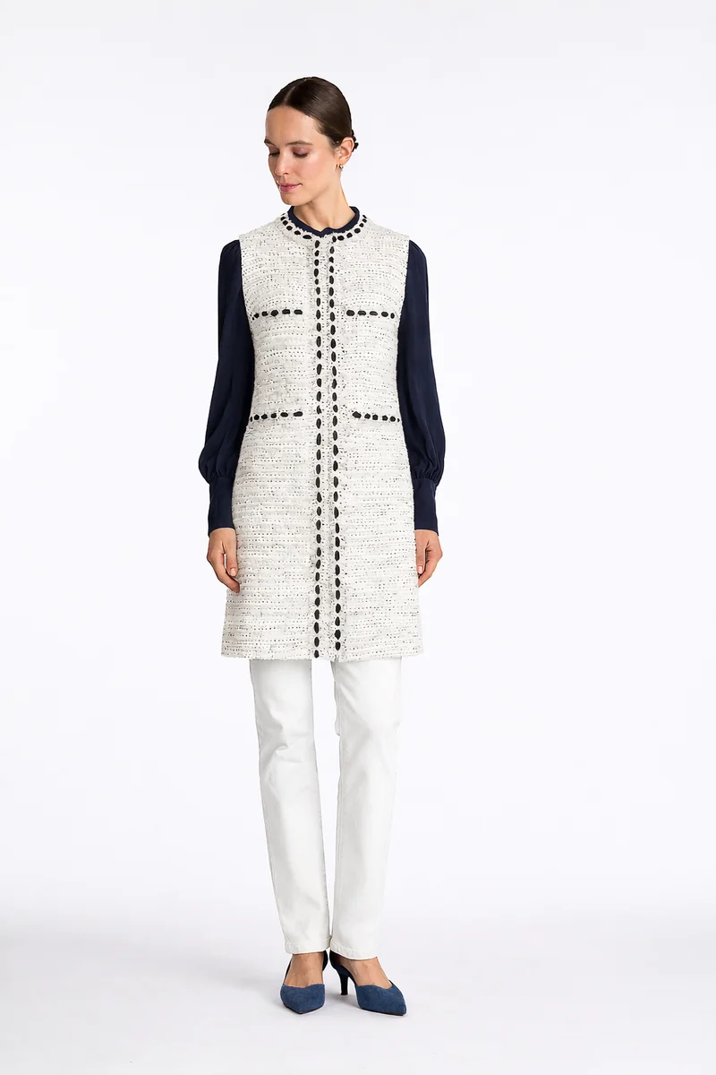 Veste longue en tweed frangé