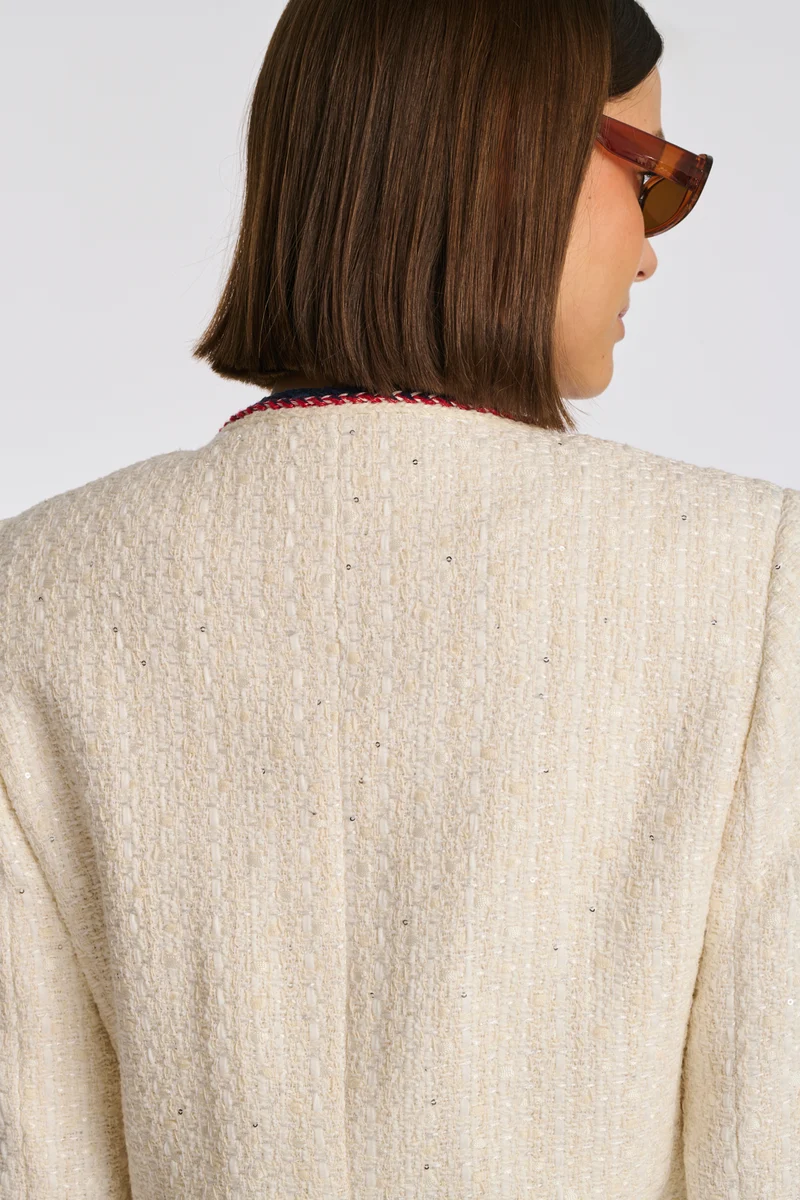 Veste longue en tweed galonnée