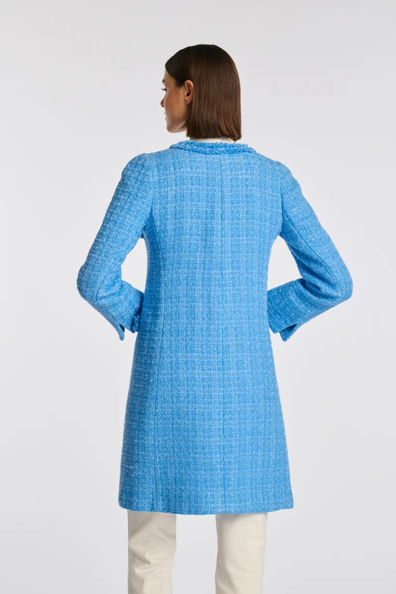 Manteau en tweed frangé