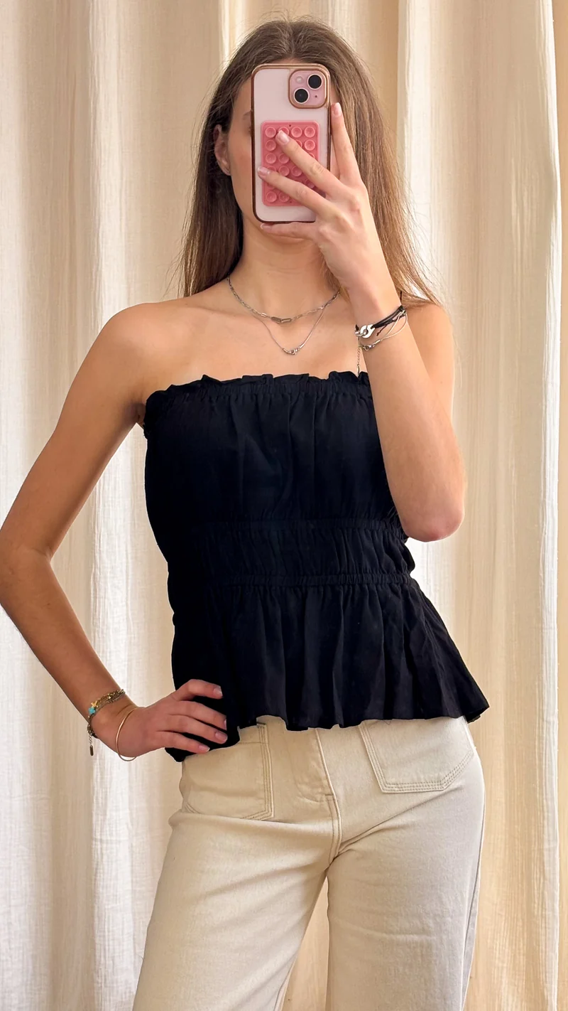 Top Laure – Top bustier noir smocké à volants