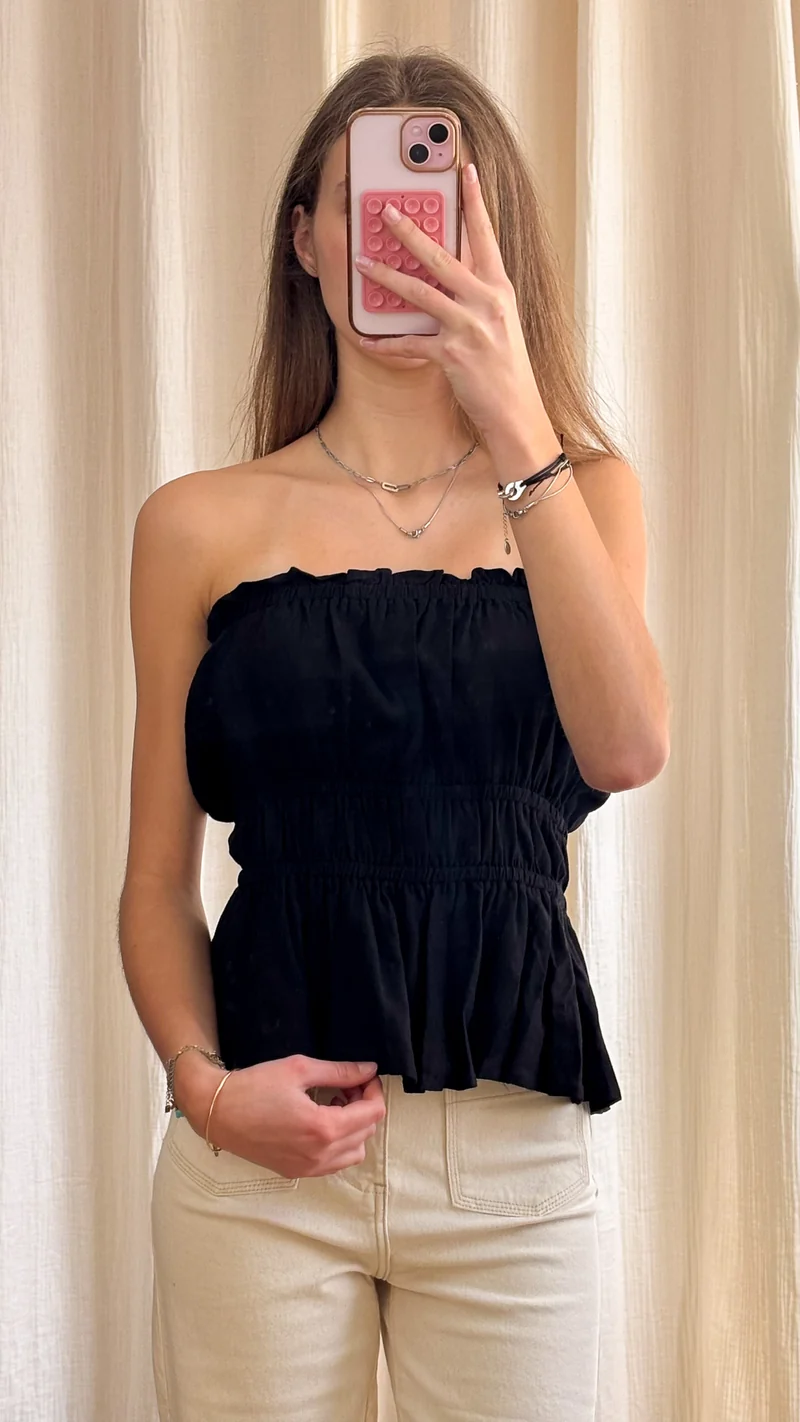 Top Laure – Top bustier noir smocké à volants