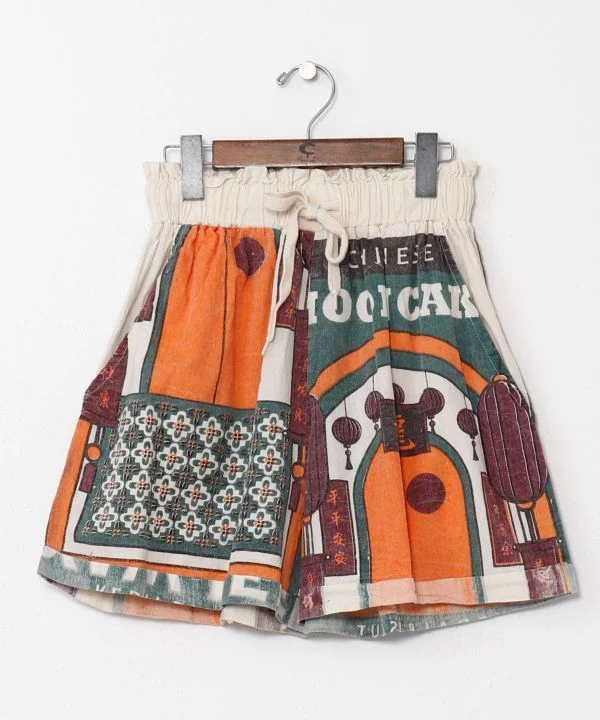 Shorts en coton à motif inspiré de la publicité