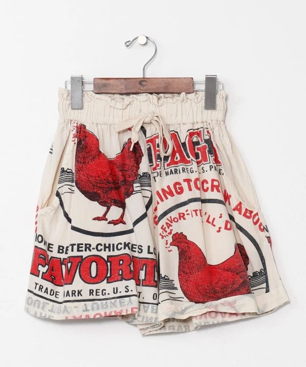 Shorts en coton à motif inspiré de la publicité