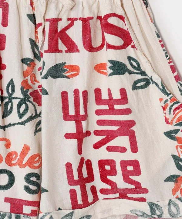 Shorts en coton à motif inspiré de la publicité