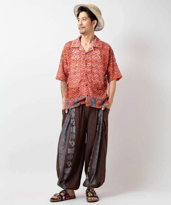 Pantalon harem à motif OM