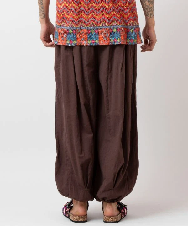 Pantalon harem à motif OM
