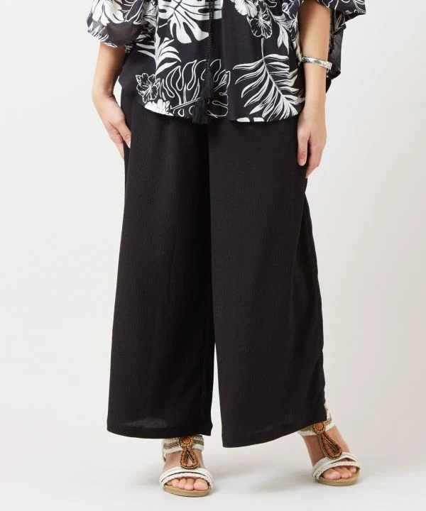 Pantalon en maille stretch évasée décontractée
