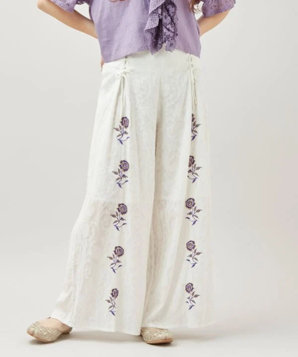 Pantalon évasé à motif jacquard floral
