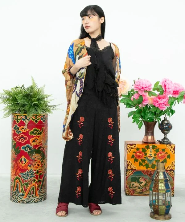 Pantalon évasé à motif jacquard floral