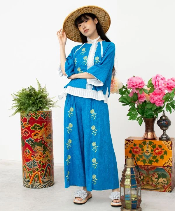 Pantalon évasé à motif jacquard floral