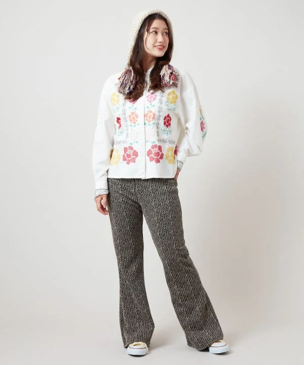 Pantalon bootcut extensible à imprimé géométrique