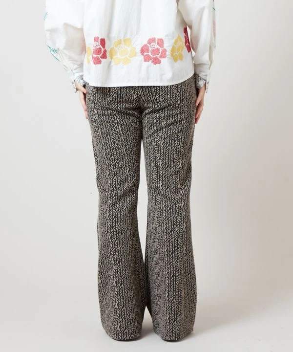 Pantalon bootcut extensible à imprimé géométrique