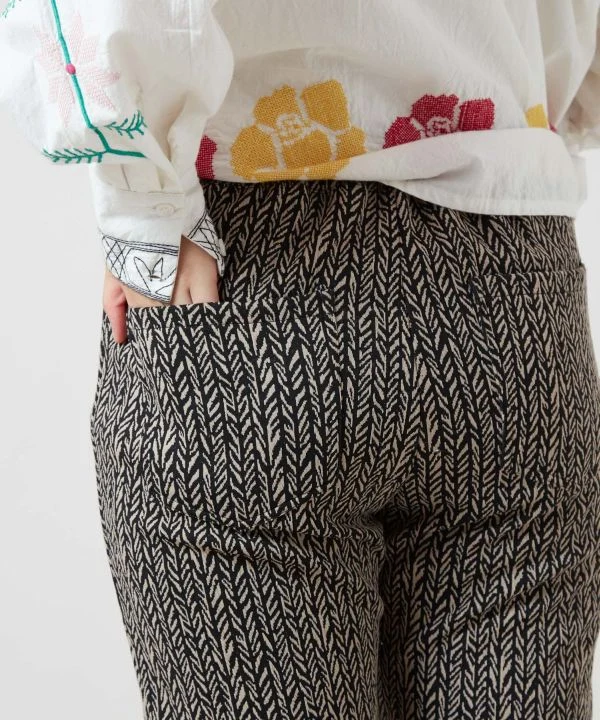 Pantalon bootcut extensible à imprimé géométrique